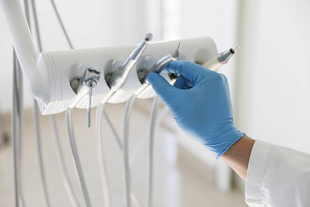 Professional Emergency Dentist technician working in Milan, OH